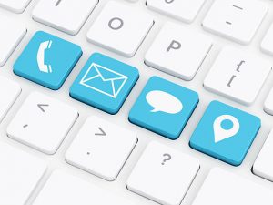 Phone sign, map pointer sign, envelope sign and message sign on keyboard key